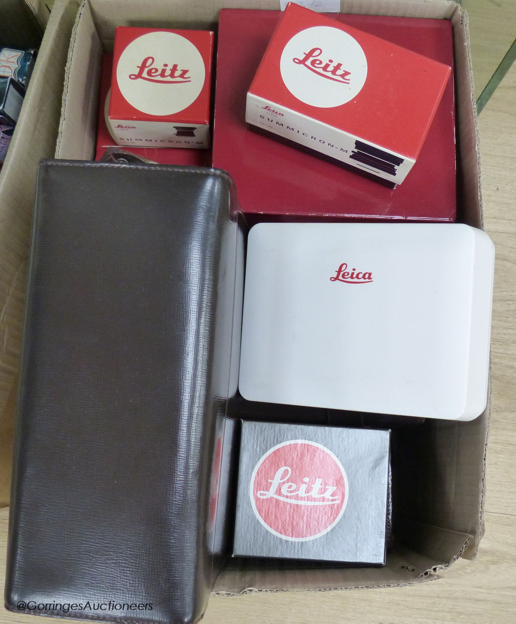 A collection of vacant 20th century camera and photography accessories boxes to include Leitz, Leica, etc (all empty)